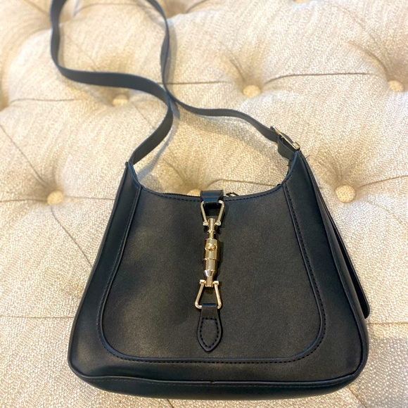 Brand New-Never Worn Shoulder bag -med sized black leather w/gold clasp detail. - Picture 2 of 5